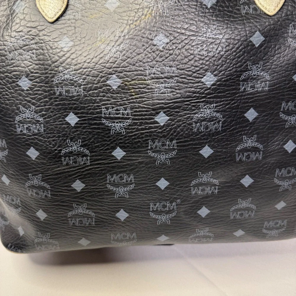 MCM Visetos Monogram Medium Tote Bag Black Gold‎ Lion Graphic Striped